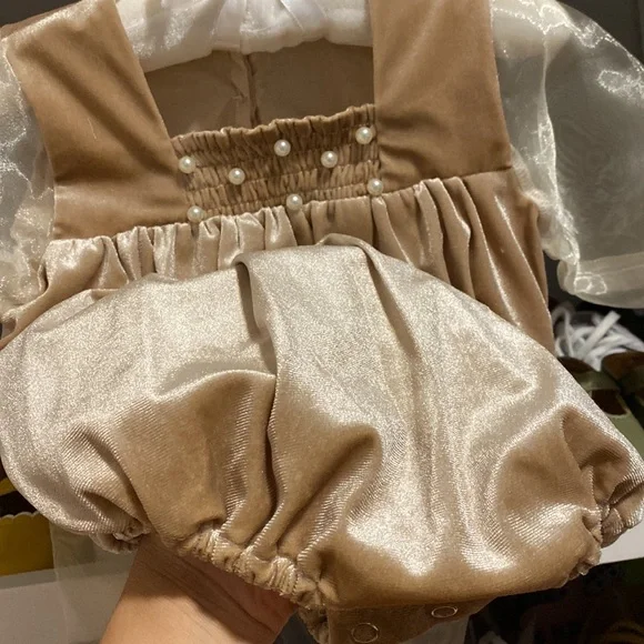 It’s not from Petit Maison Kids, romper 12-18 months.
